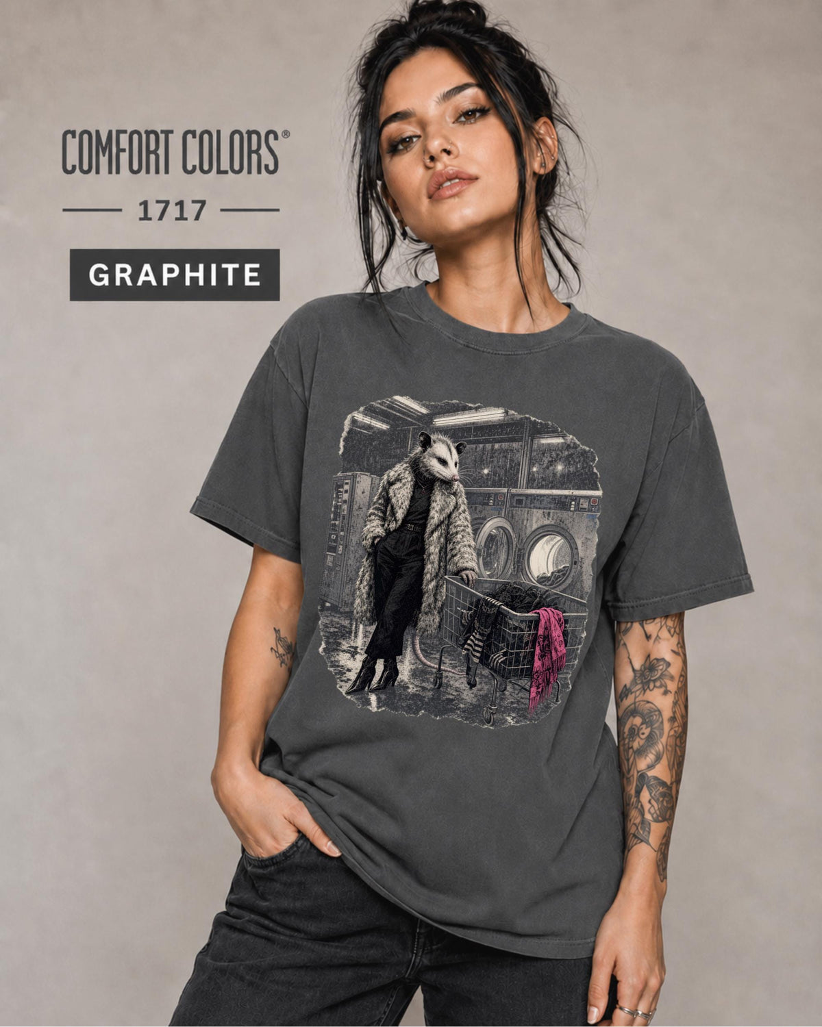 Comfort Colors Graphite tee featuring an unusual laundromat scene with a fashionable opossum.