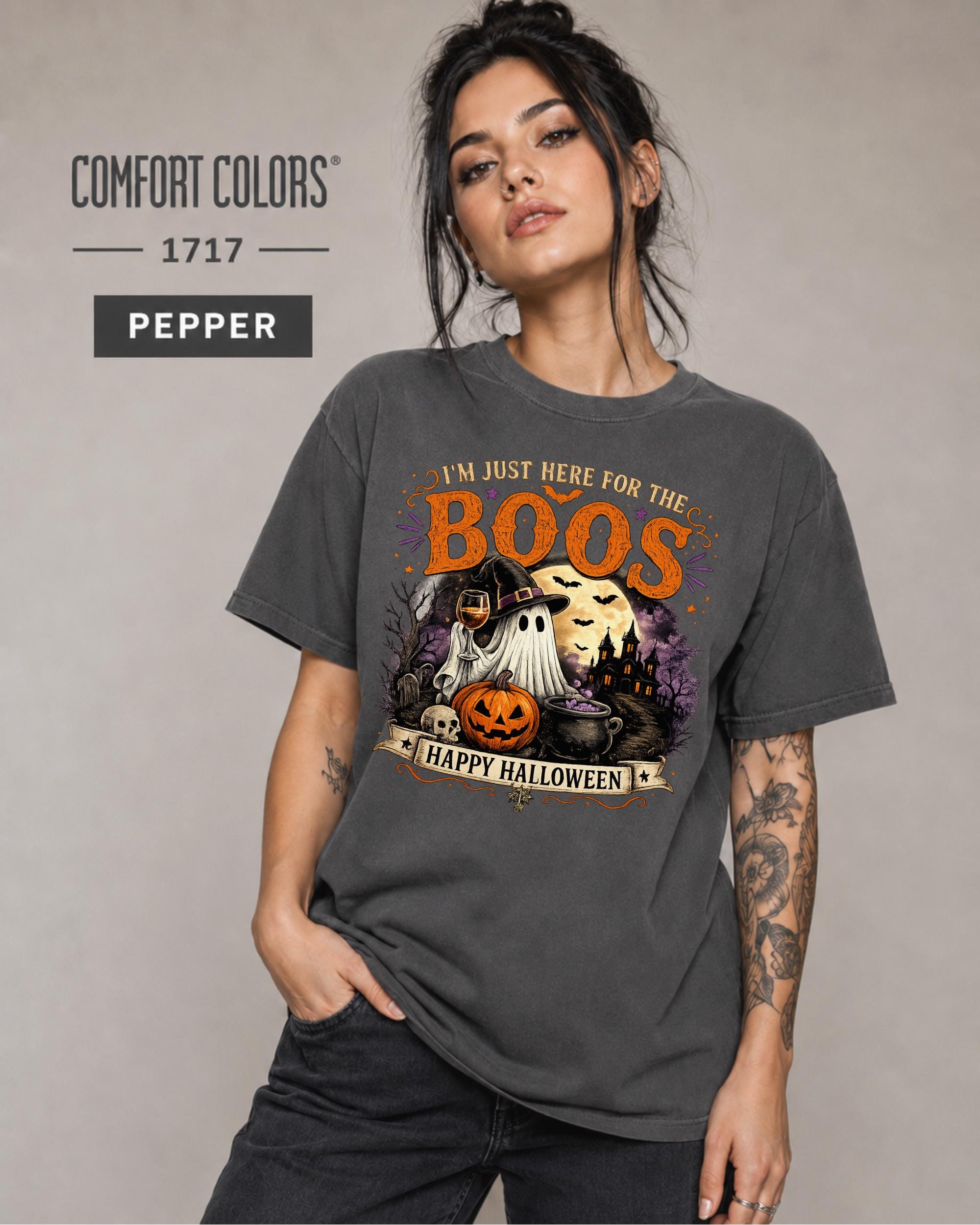 Woman wearing a Pepper Comfort Colors 1717 I’m Just Here for the Boos Halloween shirt.