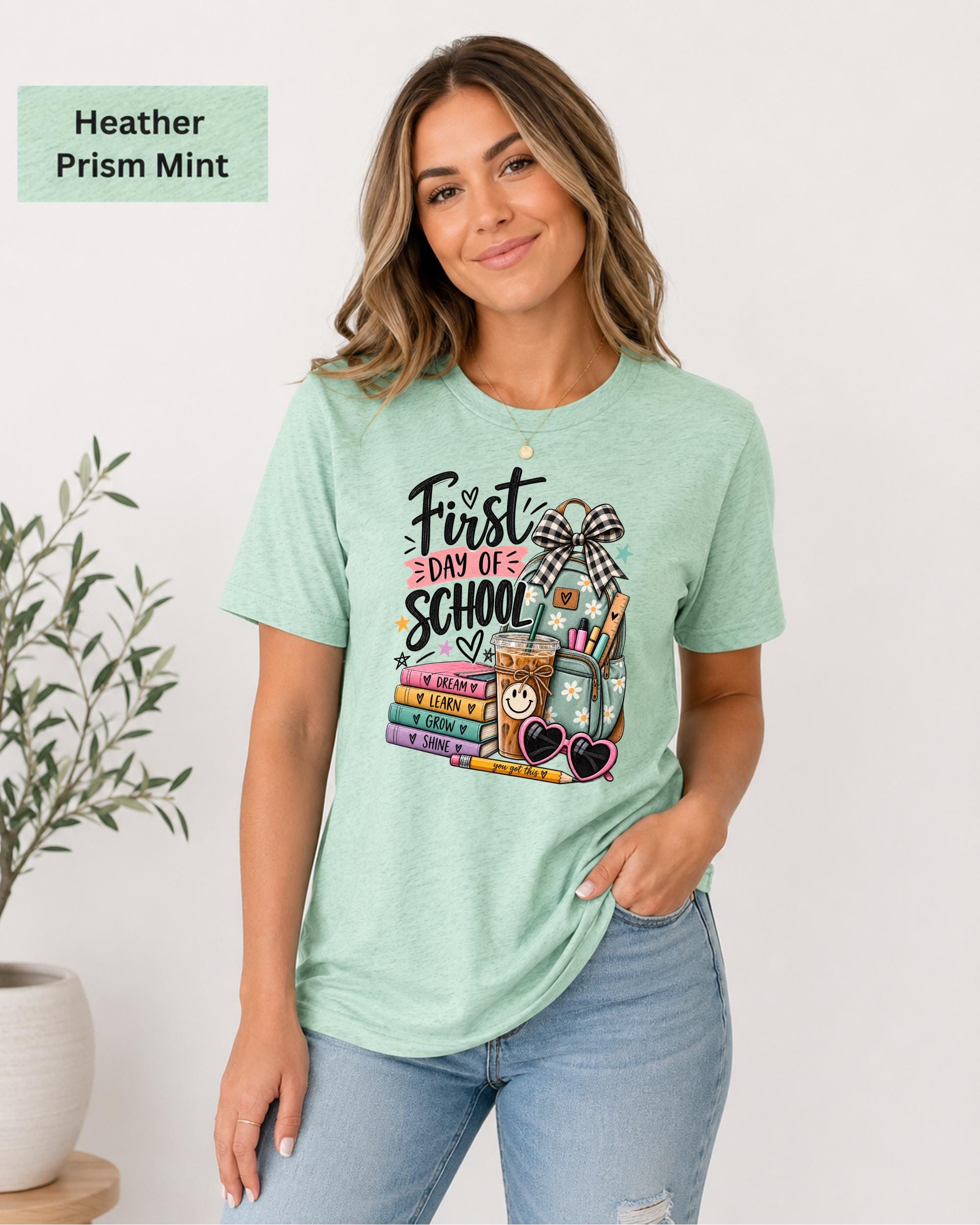 Bella Canvas 3001 classroom tee styled with jeans in a neutral indoor setting.