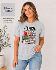 Teacher graphic tee featuring stacked books, pencils, scissors, apple, and coffee tumbler.