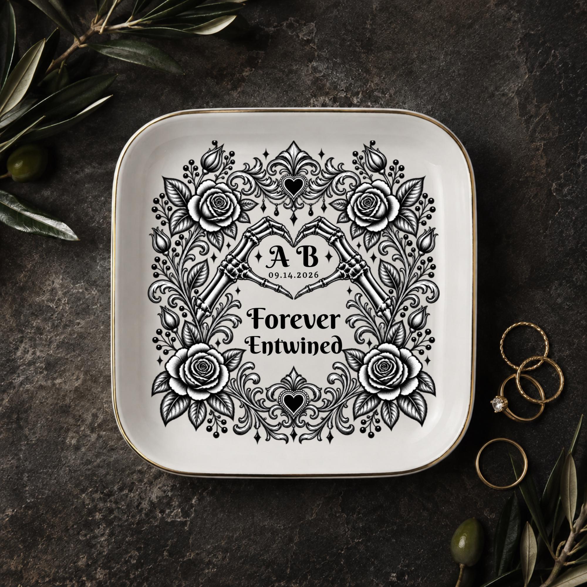 Gothic jewelry dish with skeleton hands forming a heart, black roses, custom initials, date, and Forever Entwined text.