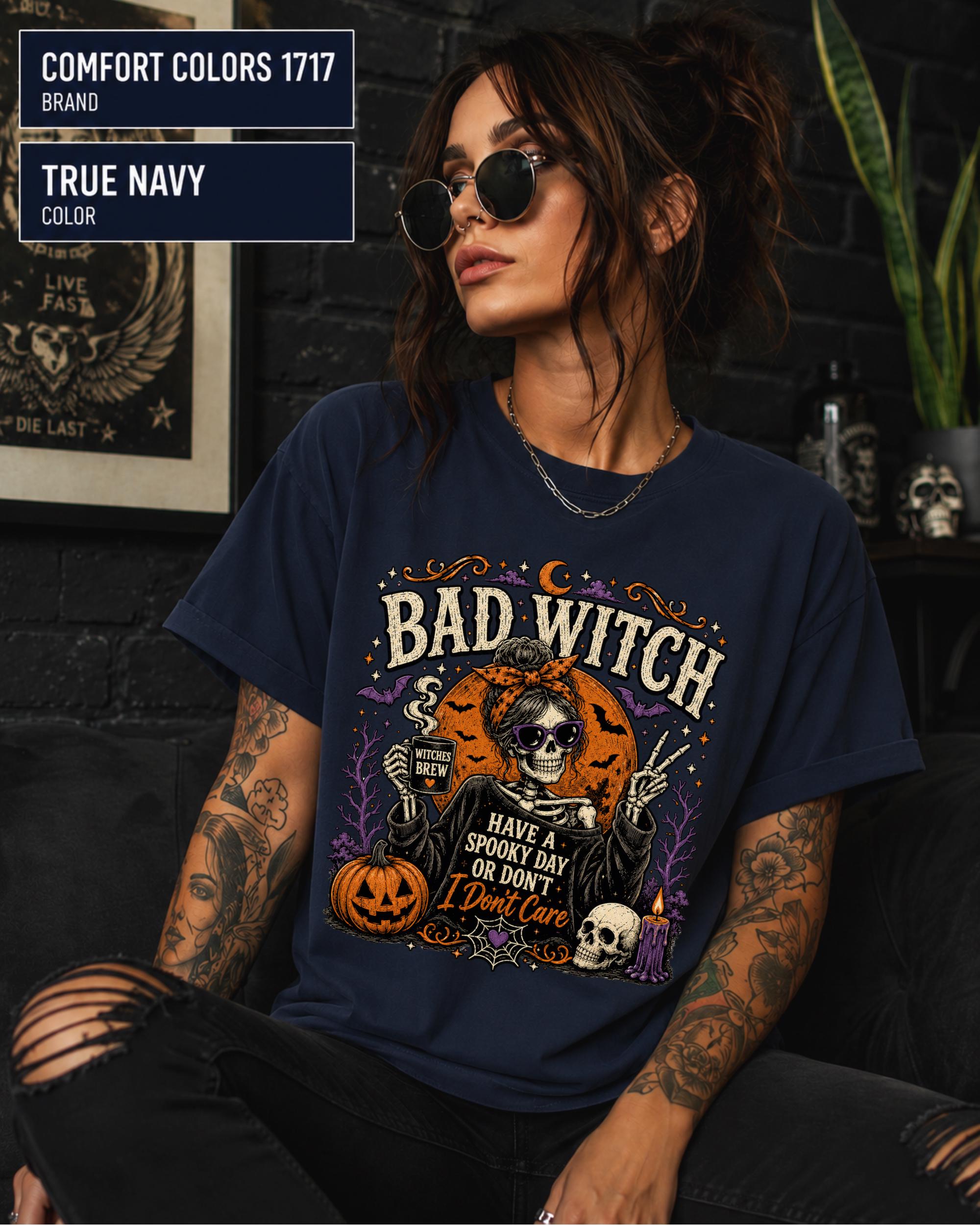 Vintage Halloween graphic tee featuring a skeleton with sunglasses, orange bow, and Witches Brew mug.