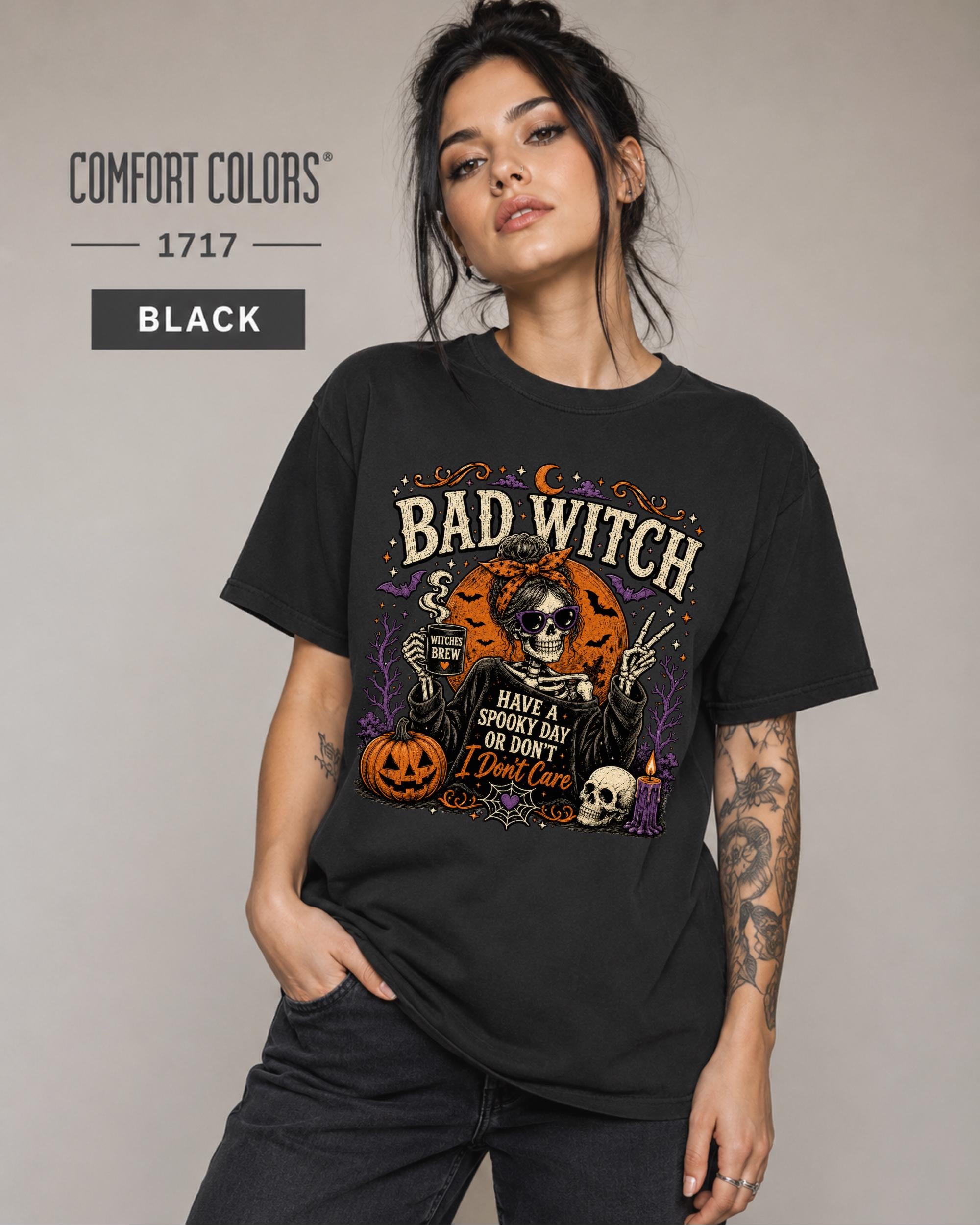 Witchy Halloween top styled with black jeans in a neutral studio setting.