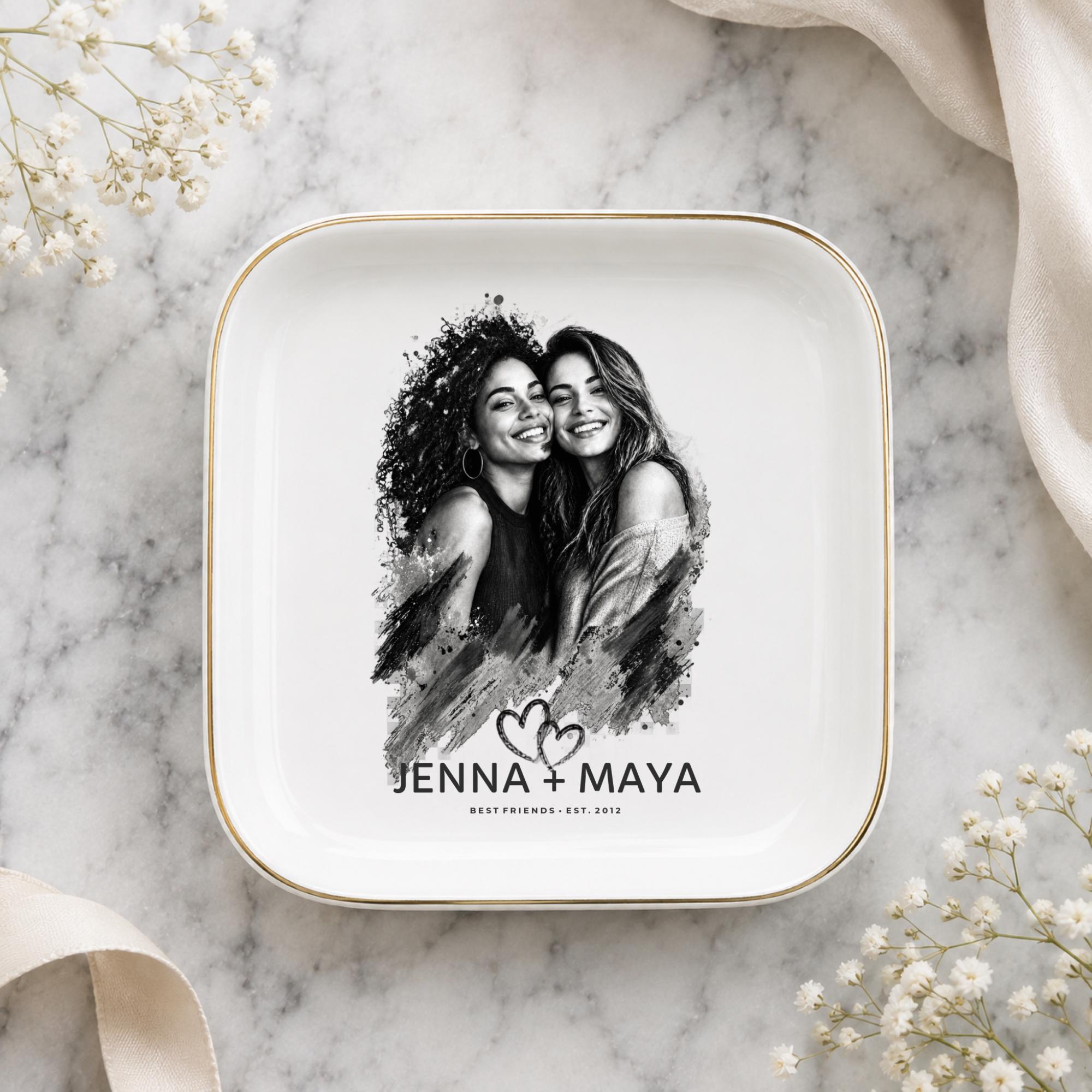 Personalized best friend jewelry dish featuring a custom black-and-white photo, two names, established year, heart design, and gold rim.