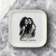Personalized best friend jewelry dish featuring a custom black-and-white photo, two names, established year, heart design, and gold rim.