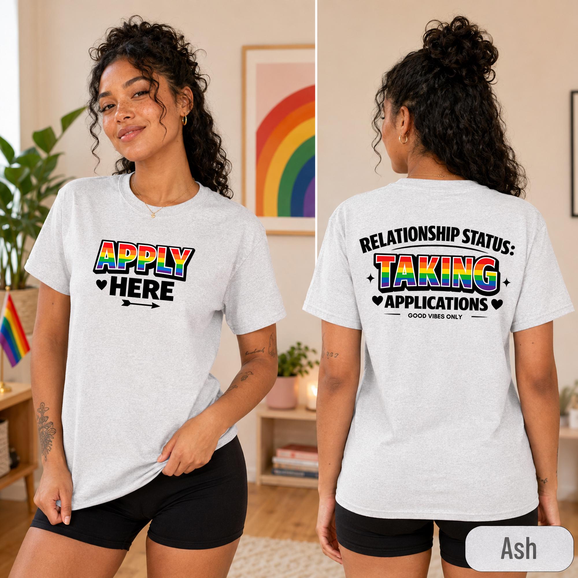 Front & Back view of a Pride shirt reading Relationship Status Taking Applications with rainbow striped text.