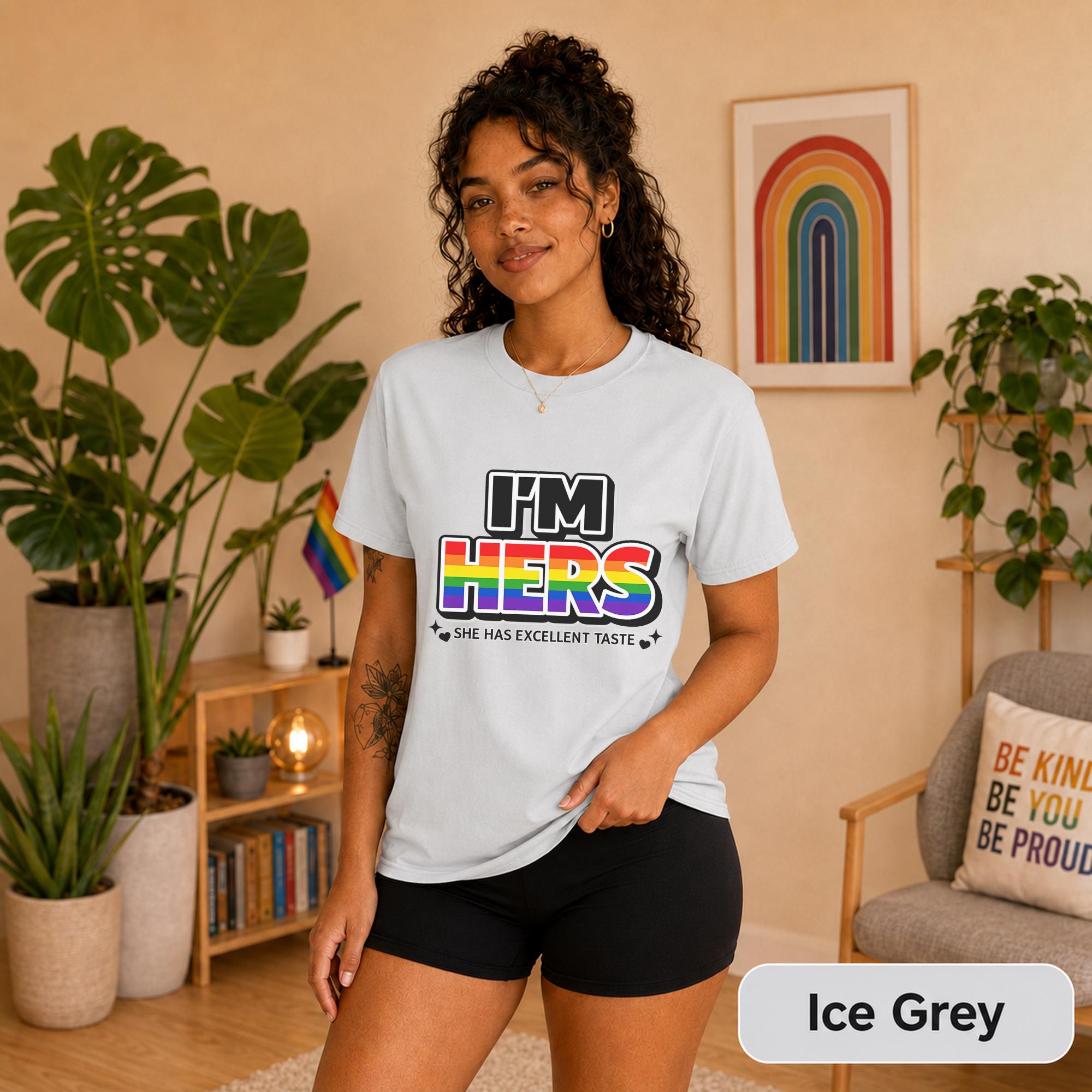 Ice grey I’m Hers shirt with rainbow lettering and She Has Excellent Taste message.