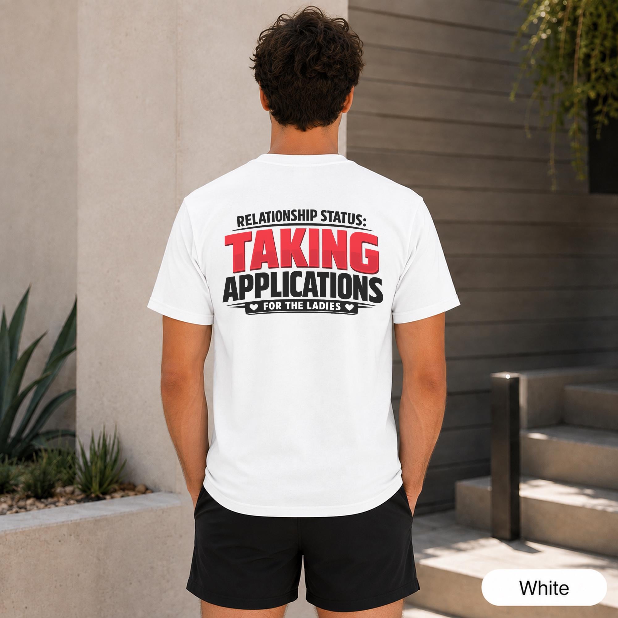 Back view of an Ash shirt reading Relationship Status Taking Applications for the Ladies.