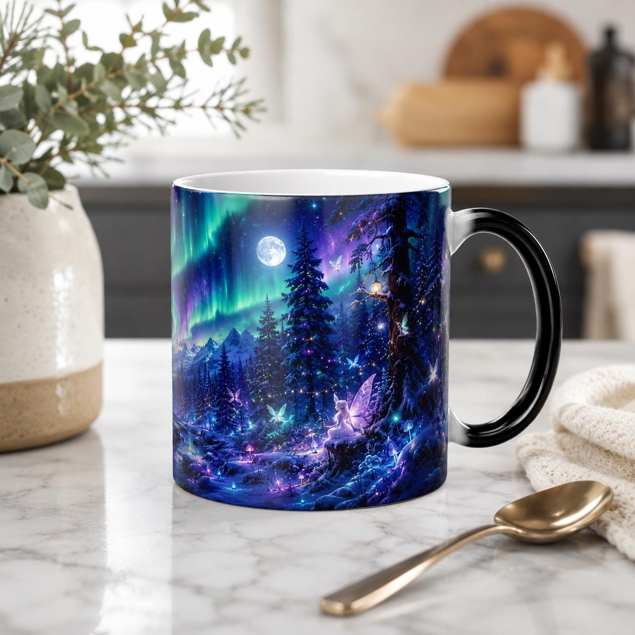 Northern lights coffee mug featuring a colorful aurora above a moonlit evergreen forest with a black handle.