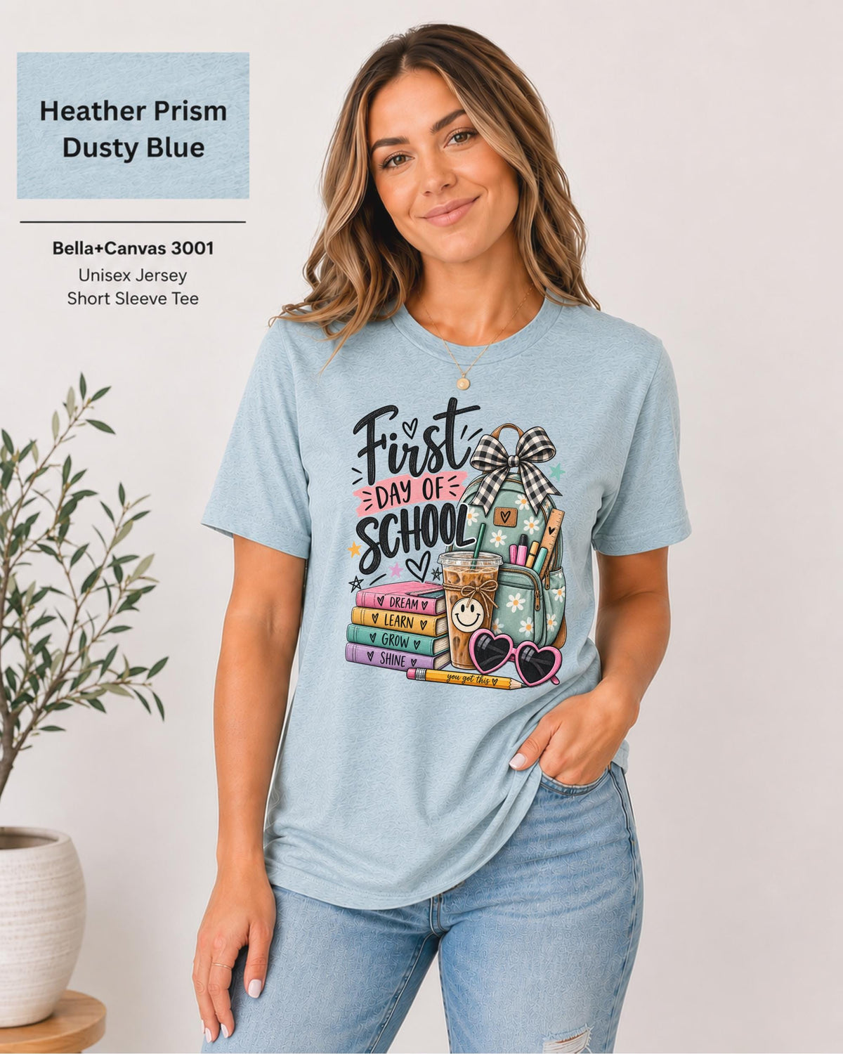 Teacher first day outfit featuring stacked books labeled Dream, Learn, Grow, and Shine.