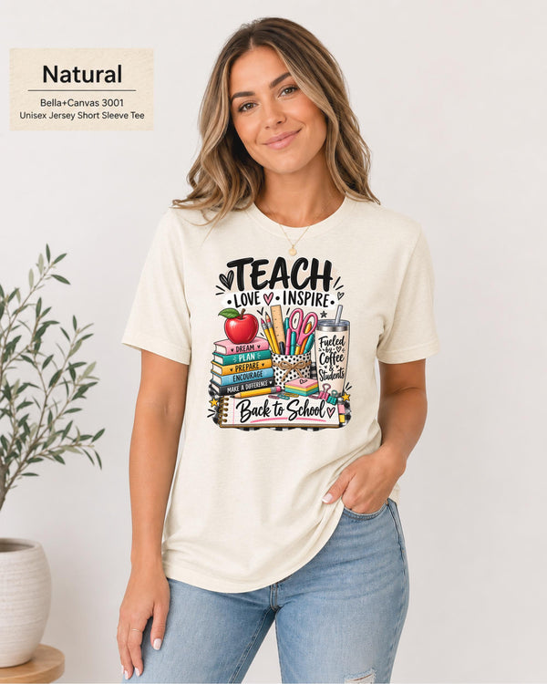 Woman wearing a Natural Bella+Canvas 3001 Teach Love Inspire back-to-school teacher shirt.