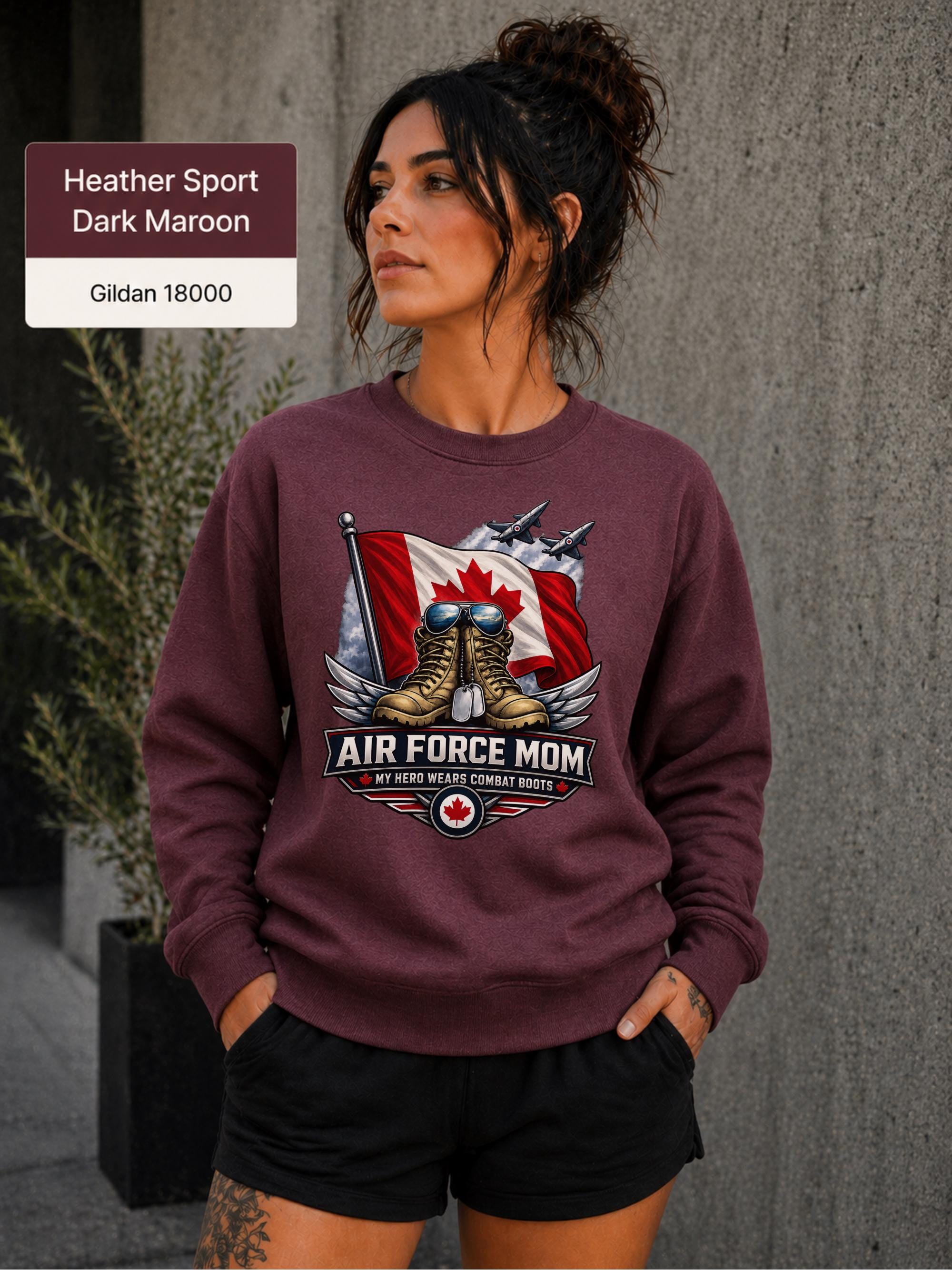 Air Force Mom dark heather maroon crewneck with Canadian flag backdrop, combat boots, aircraft, and winged graphic.