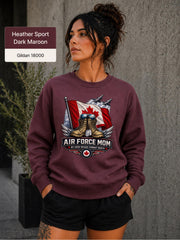 Air Force Mom dark heather maroon crewneck with Canadian flag backdrop, combat boots, aircraft, and winged graphic.
