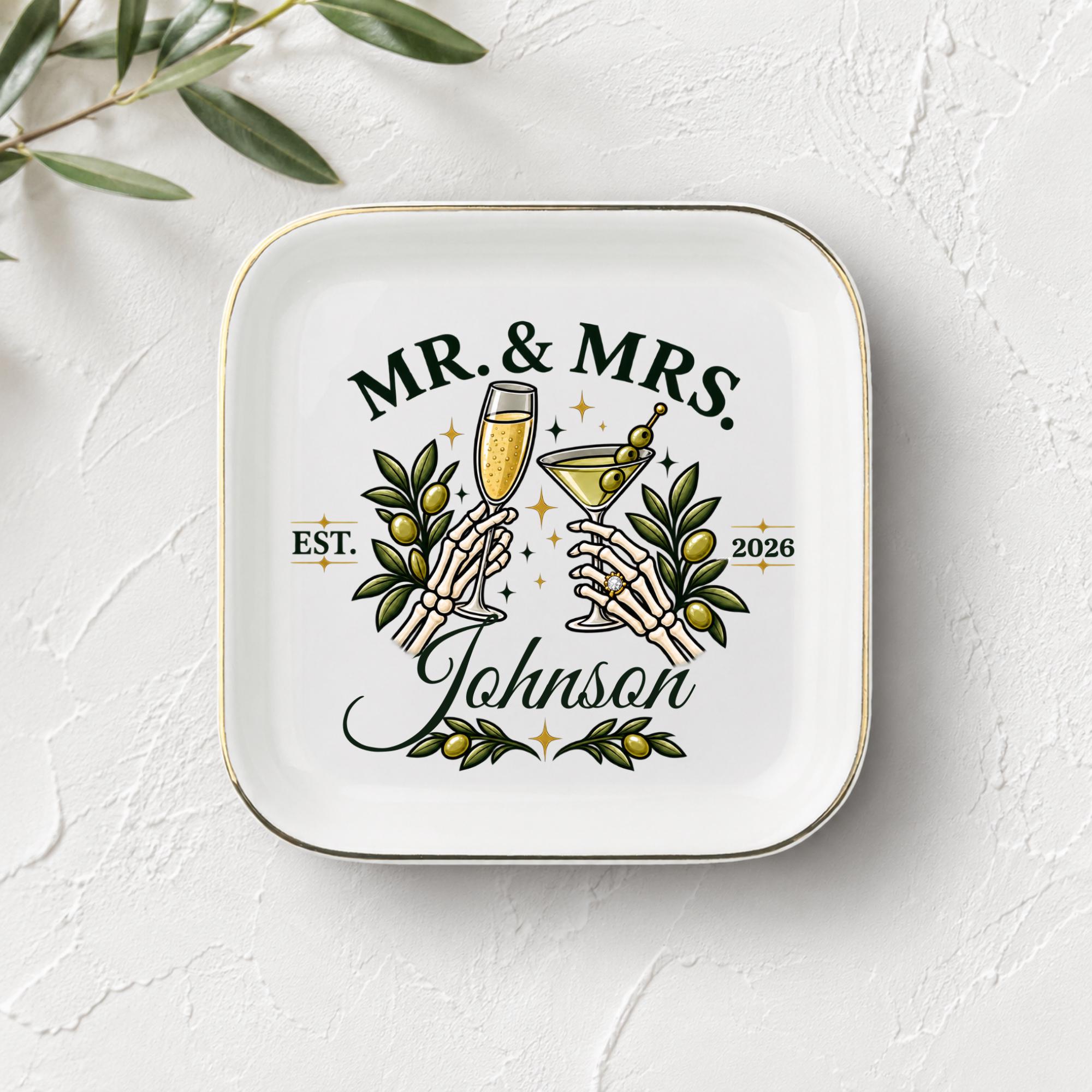 White square jewelry tray with gold rim, personalized Johnson surname, established year, and dark romantic wedding artwork.