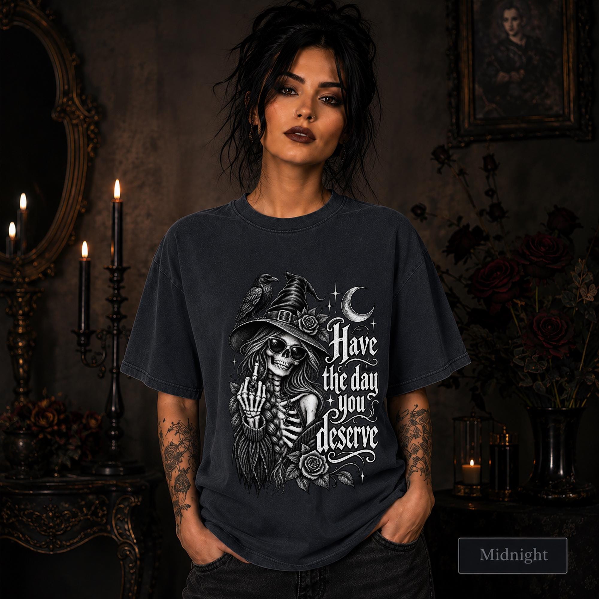 Witchy clothing design with skeletal woman wearing sunglasses and pointed hat beside a raven.