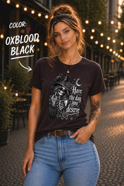 Bella Canvas gothic shirt with Have the Day You Deserve phrase and spooky witch artwork.