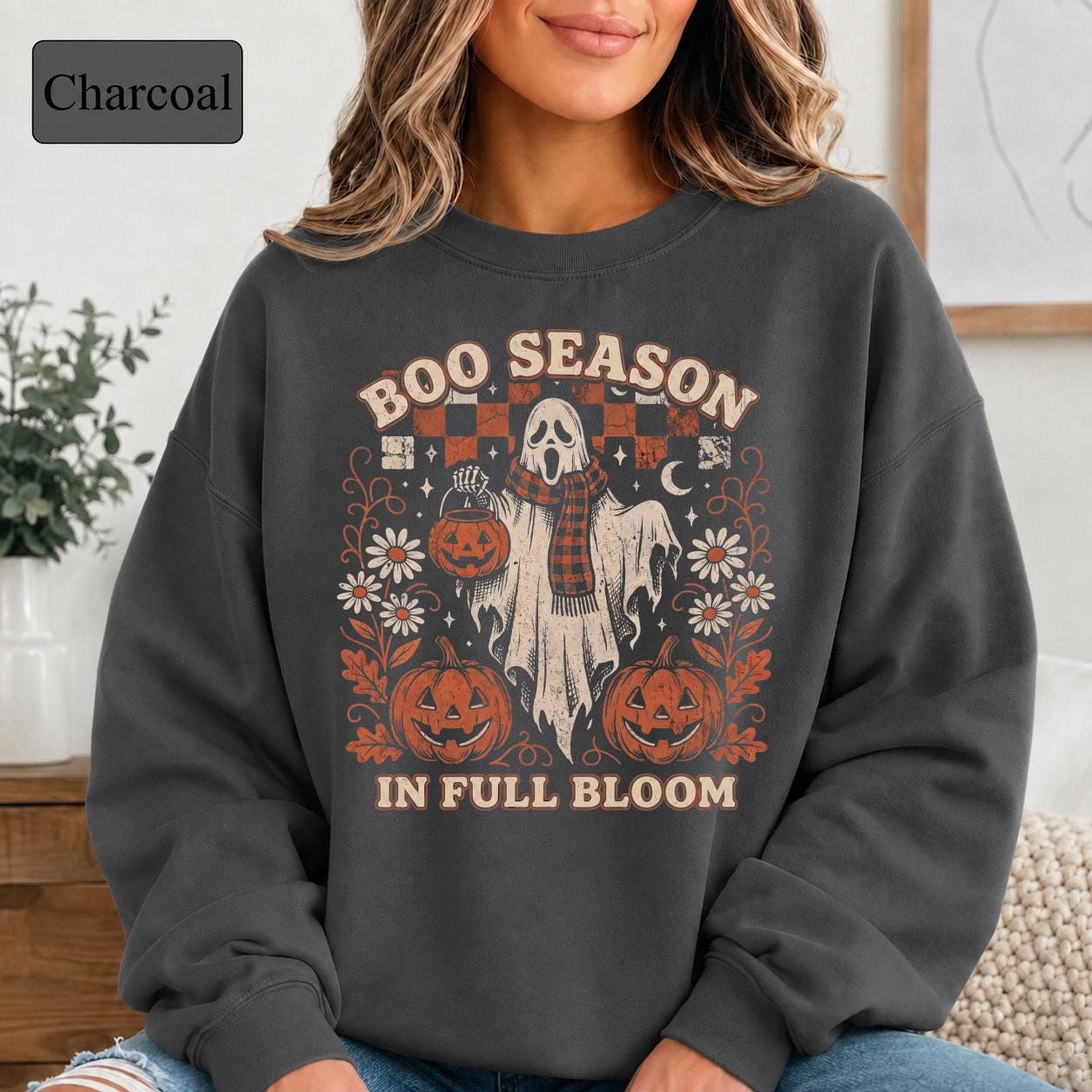 Spooky fall crewneck featuring Boo Season in Full Bloom lettering and vintage-inspired Halloween artwork.