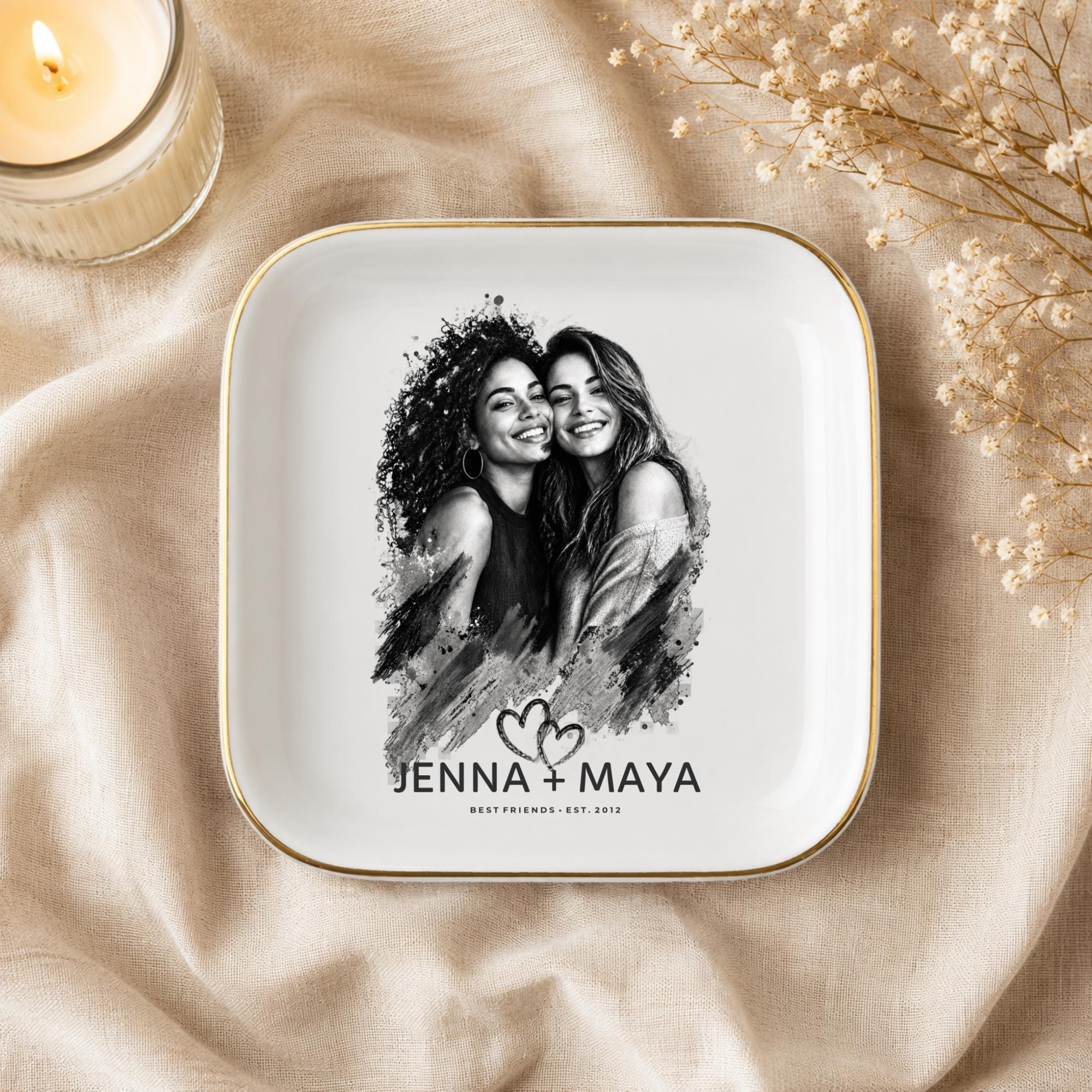 Personalized best friend jewelry dish featuring a custom black-and-white photo, two names, established year, heart design, and gold rim.