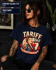 Woman wearing a True navy Comfort Colors 1717 shirt with Tariff This text, Canadian flag, maple leaves, and retro pin-up artwork.