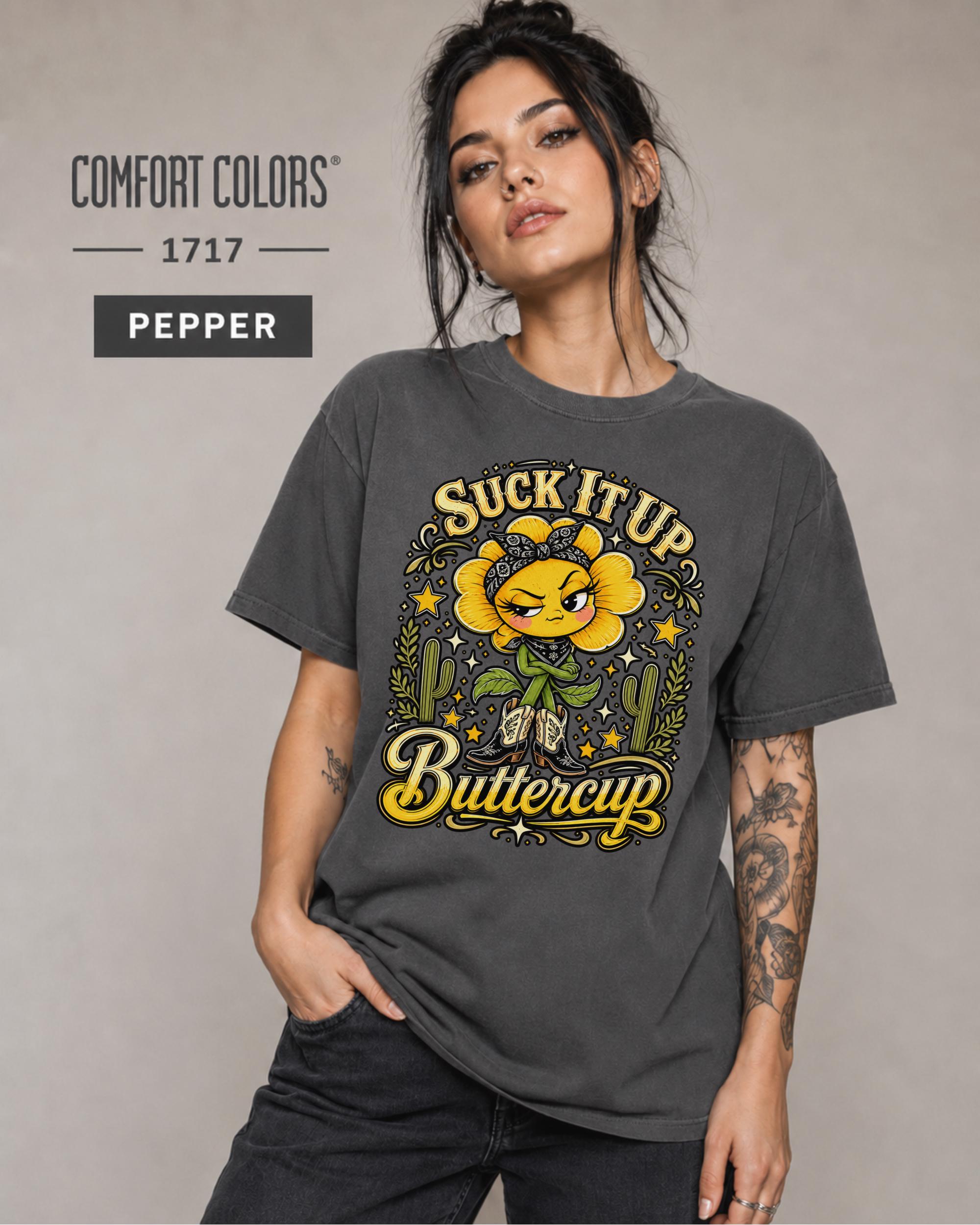Western humor graphic shirt styled with jeans and featuring bold yellow and green artwork.