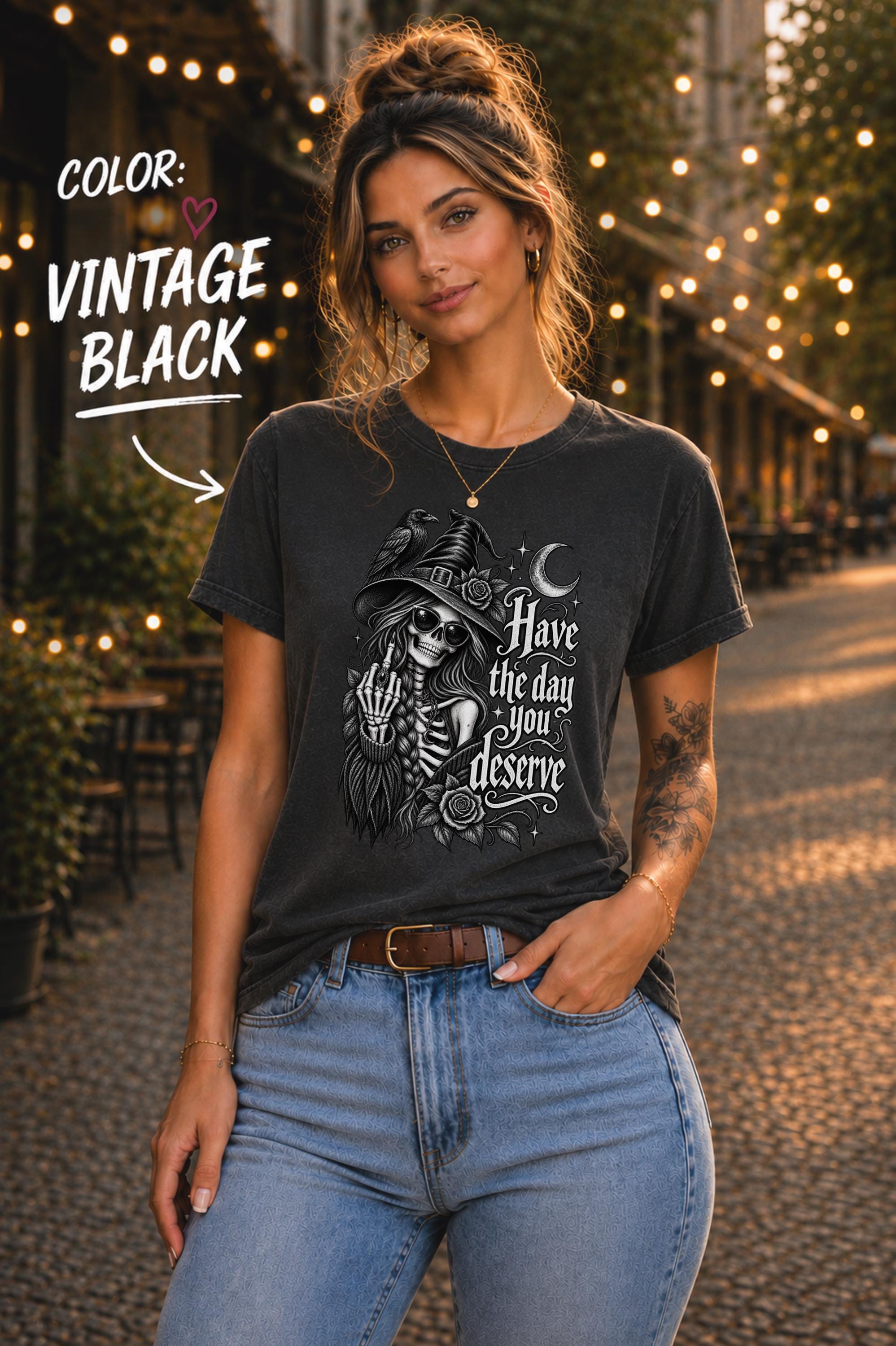 Dark aesthetic graphic tee featuring raven, skeleton woman, crescent moon, flowers, and celestial stars.