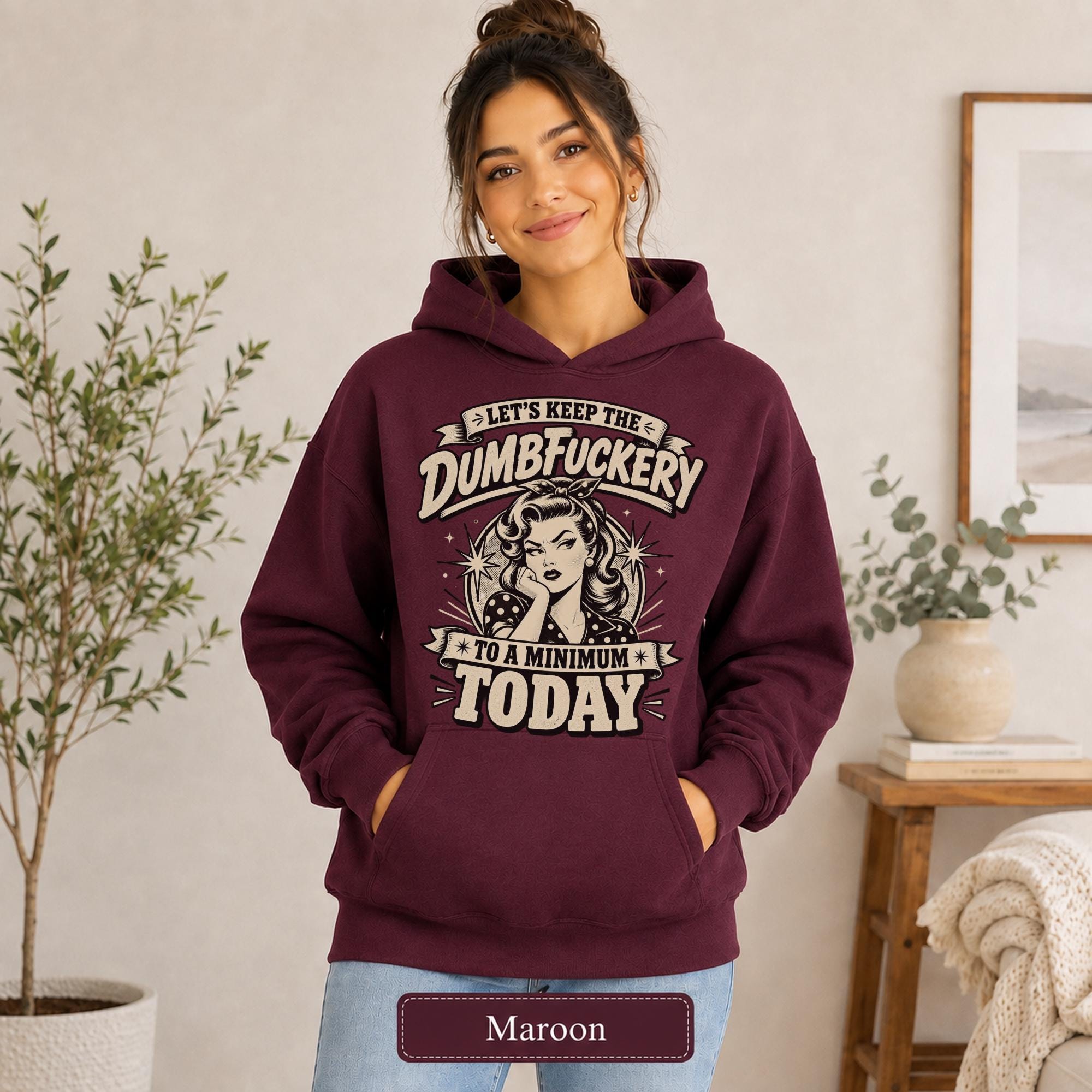 Female model in a maroon Gildan 18500 heavy blend hoodie with smooth blank front, cozy fit, and maroon color name.