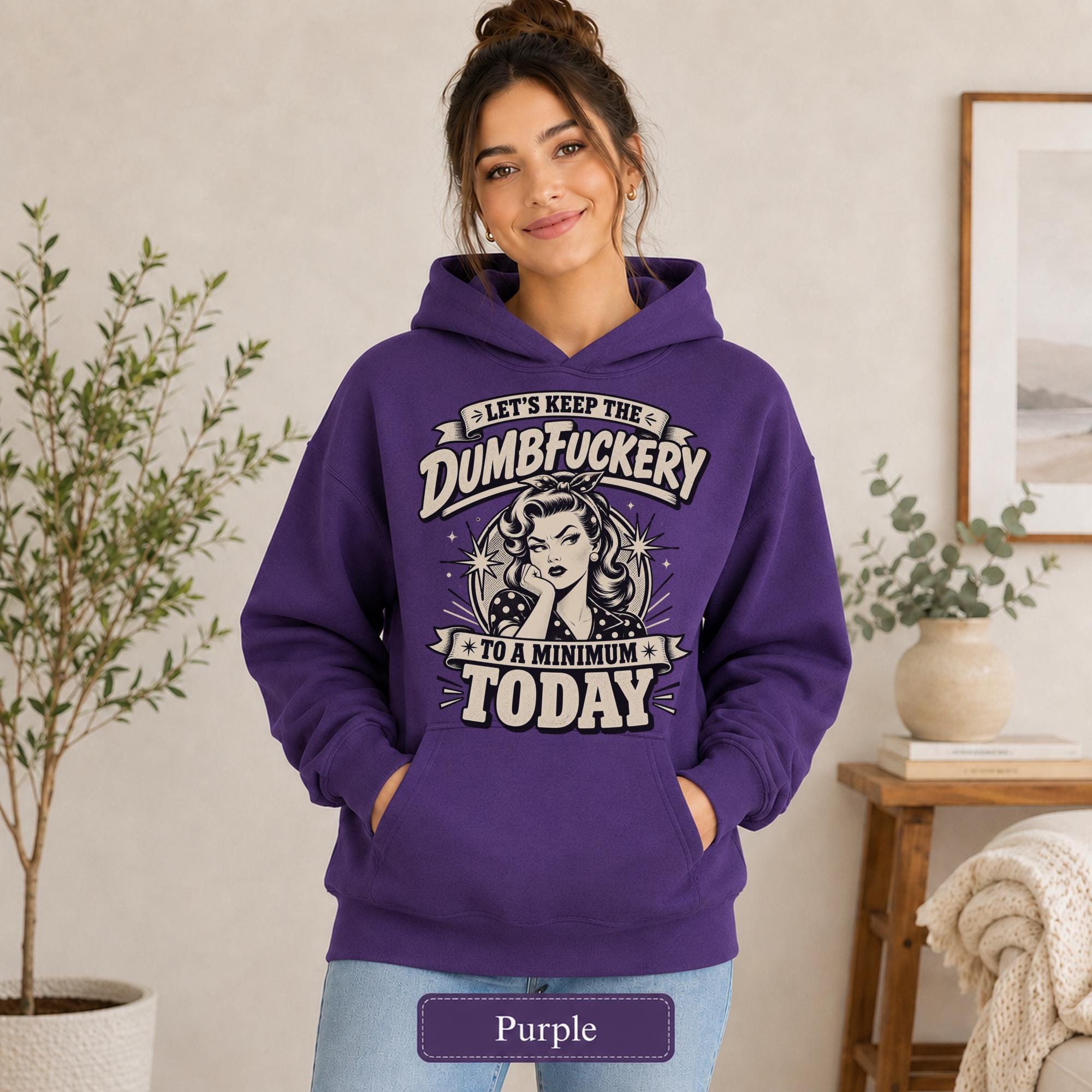 Female model wearing a purple Gildan 18500 hooded sweatshirt with blank chest area, front pocket, and purple color name.