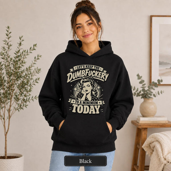 Retro sarcastic graphic reading “Let’s Keep the Dumbfuckery to a Minimum Today” with a vintage pin-up woman, bold distressed lettering, and cream black ink styling.