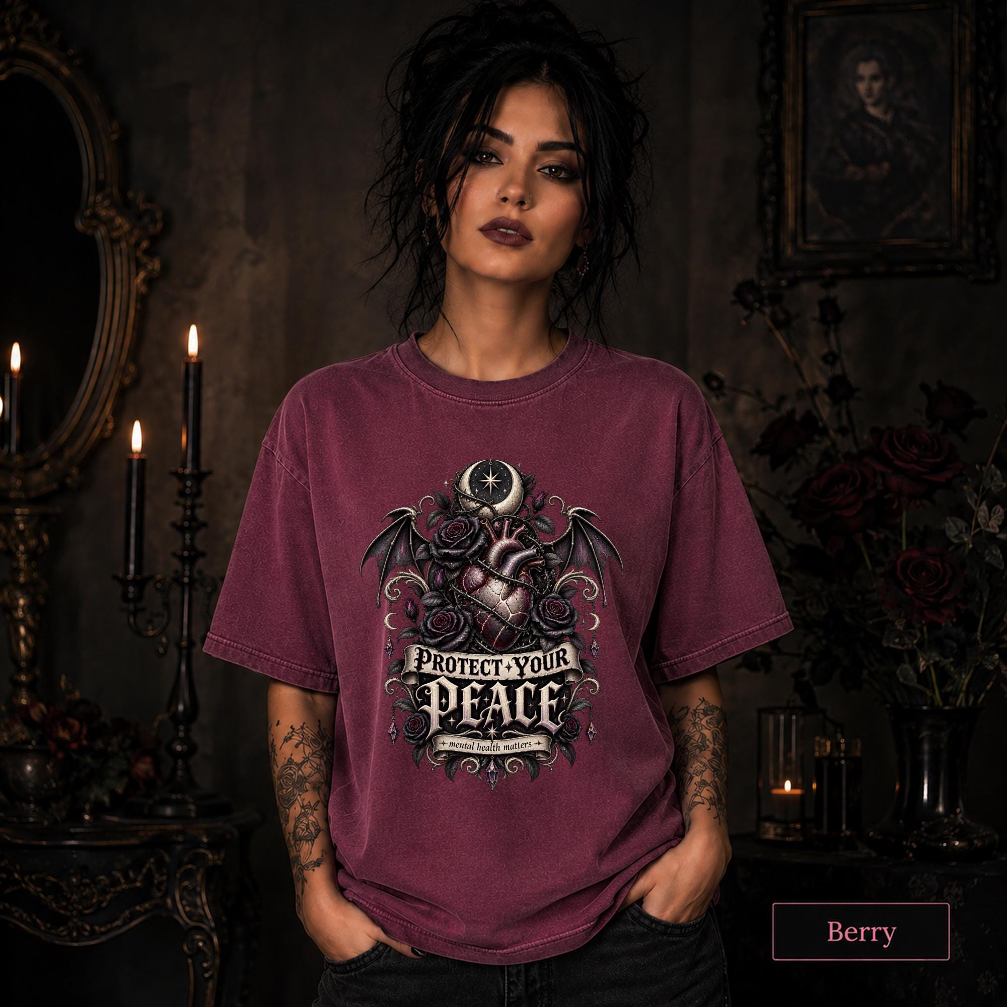 Protect Your Peace gothic berry T-shirt featuring an anatomical heart, dark roses, bat wings, crescent moon, and mental health matters artwork.