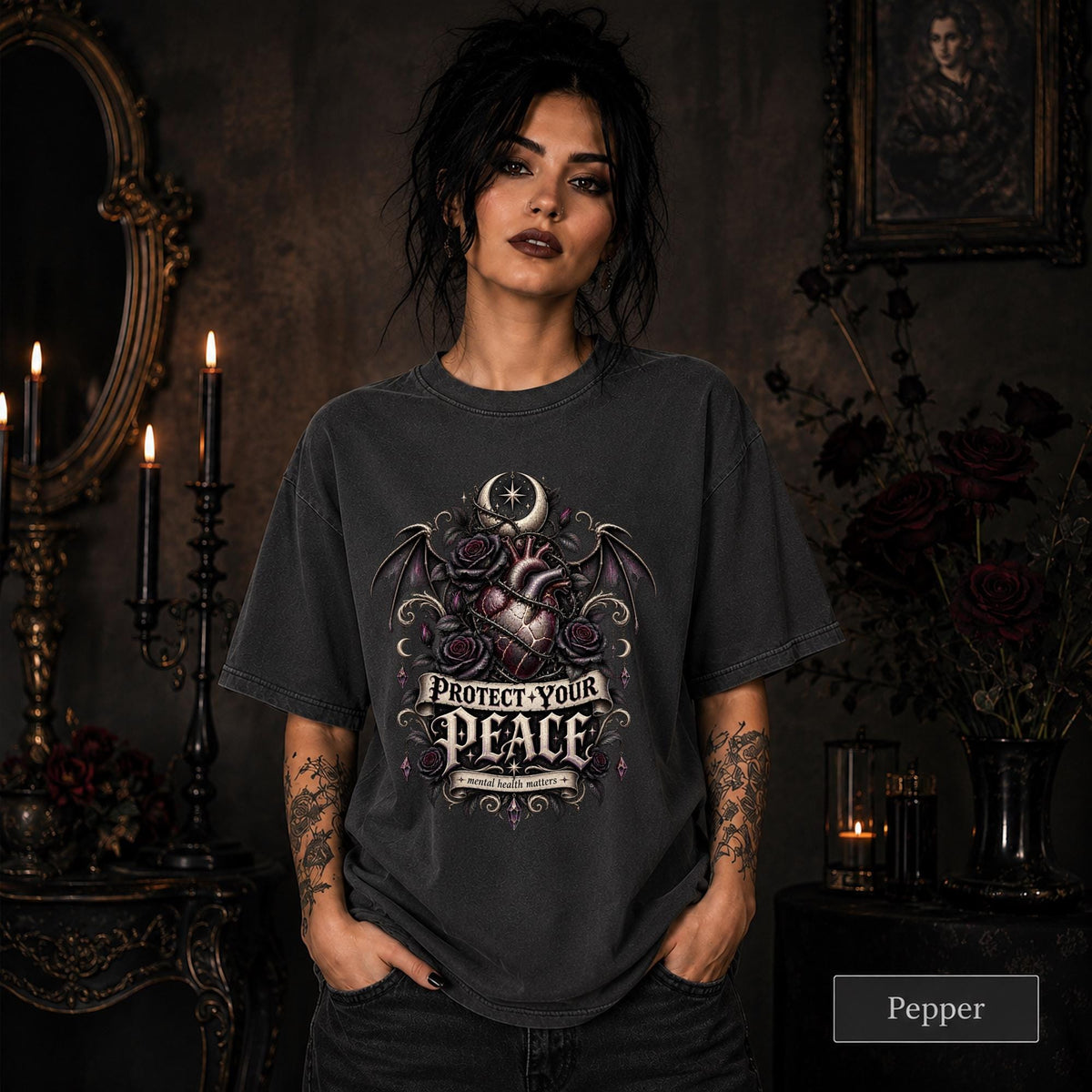 Protect Your Peace gothic pepper T-shirt featuring an anatomical heart, dark roses, bat wings, crescent moon, and mental health matters artwork.
