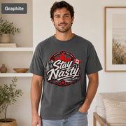 Vintage-inspired Canada T-shirt with mountain scenery, evergreen trees, maple leaf, and flag artwork.