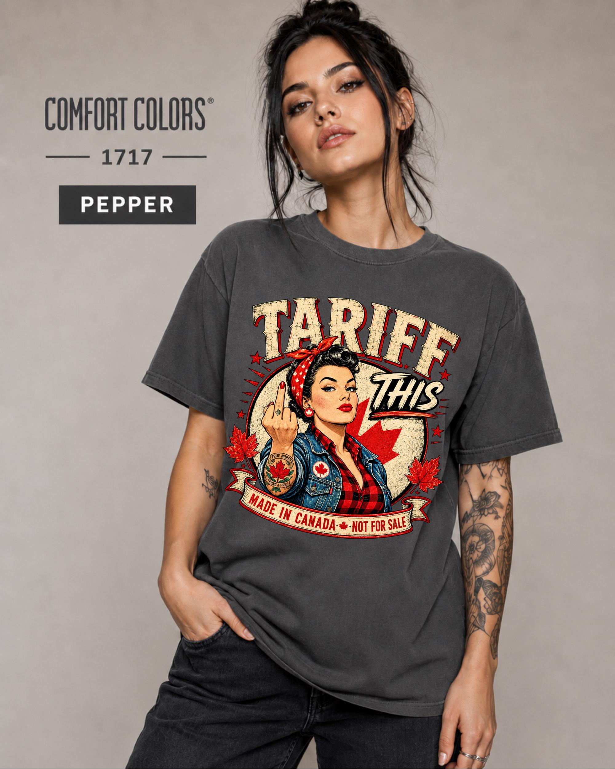 Woman wearing a Pepper Comfort Colors 1717 shirt with Tariff This text, Canadian flag, maple leaves, and retro pin-up artwork.
