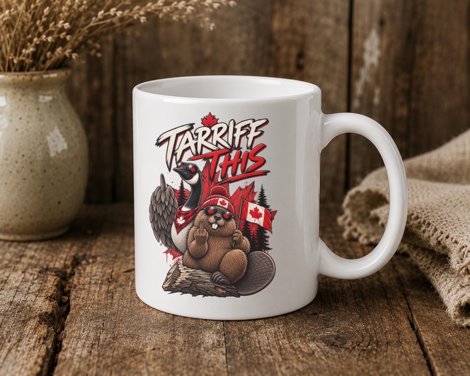 Patriotic Canadian coffee mug with red maple leaf, flag details, and sarcastic Tariff This lettering.