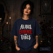 Alibis Evidence and Vibes graphic T-shirt in true navy featuring bold red and white gothic lettering on a dark unisex tee.