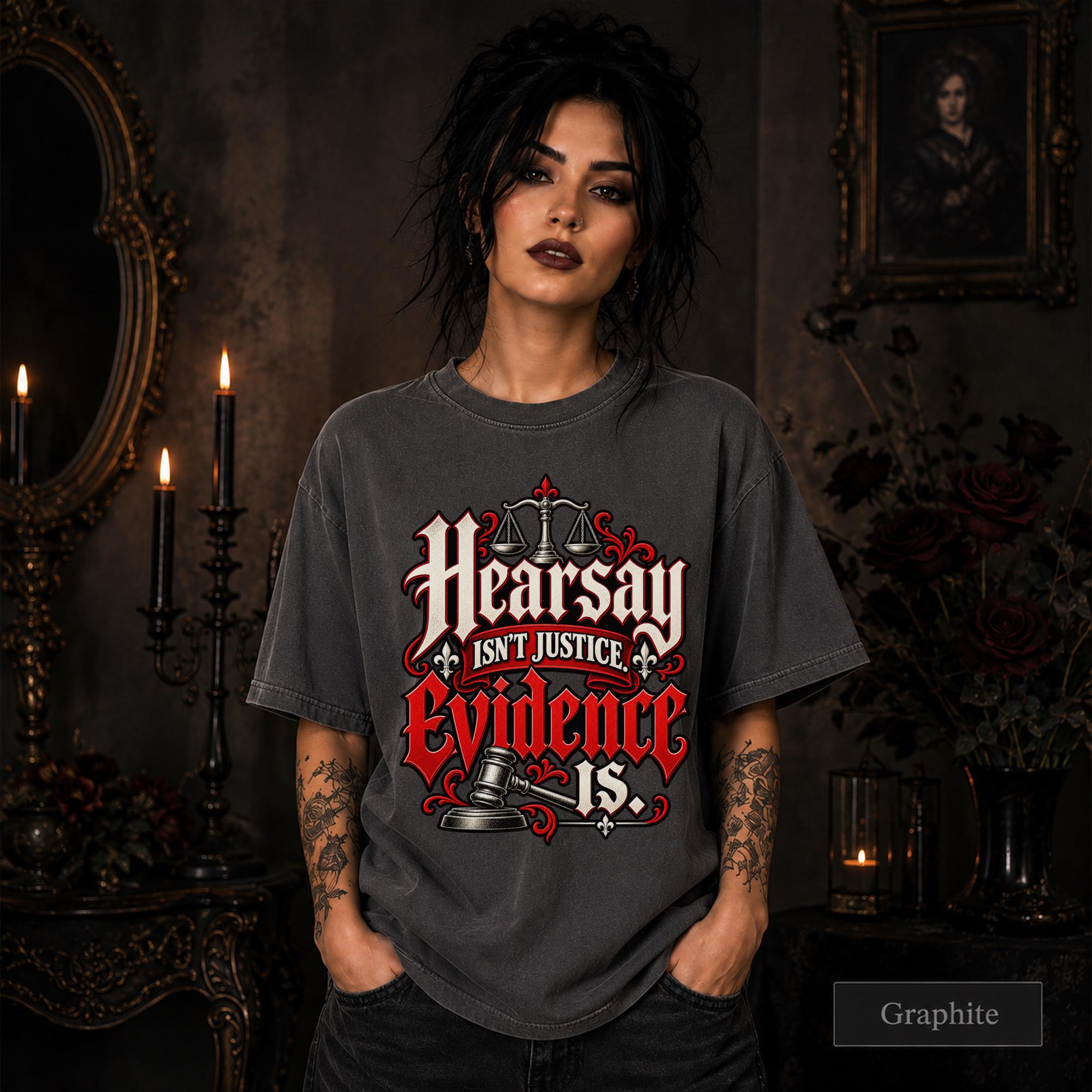 Hearsay Isn’t Justice Evidence Is graphite T-shirt featuring red and white gothic lettering, scales of justice, and a judge’s gavel.