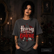 Hearsay Isn’t Justice Evidence Is graphite T-shirt featuring red and white gothic lettering, scales of justice, and a judge’s gavel.
