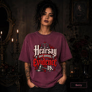 Hearsay Isn’t Justice Evidence Is berry T-shirt featuring red and white gothic lettering, scales of justice, and a judge’s gavel.