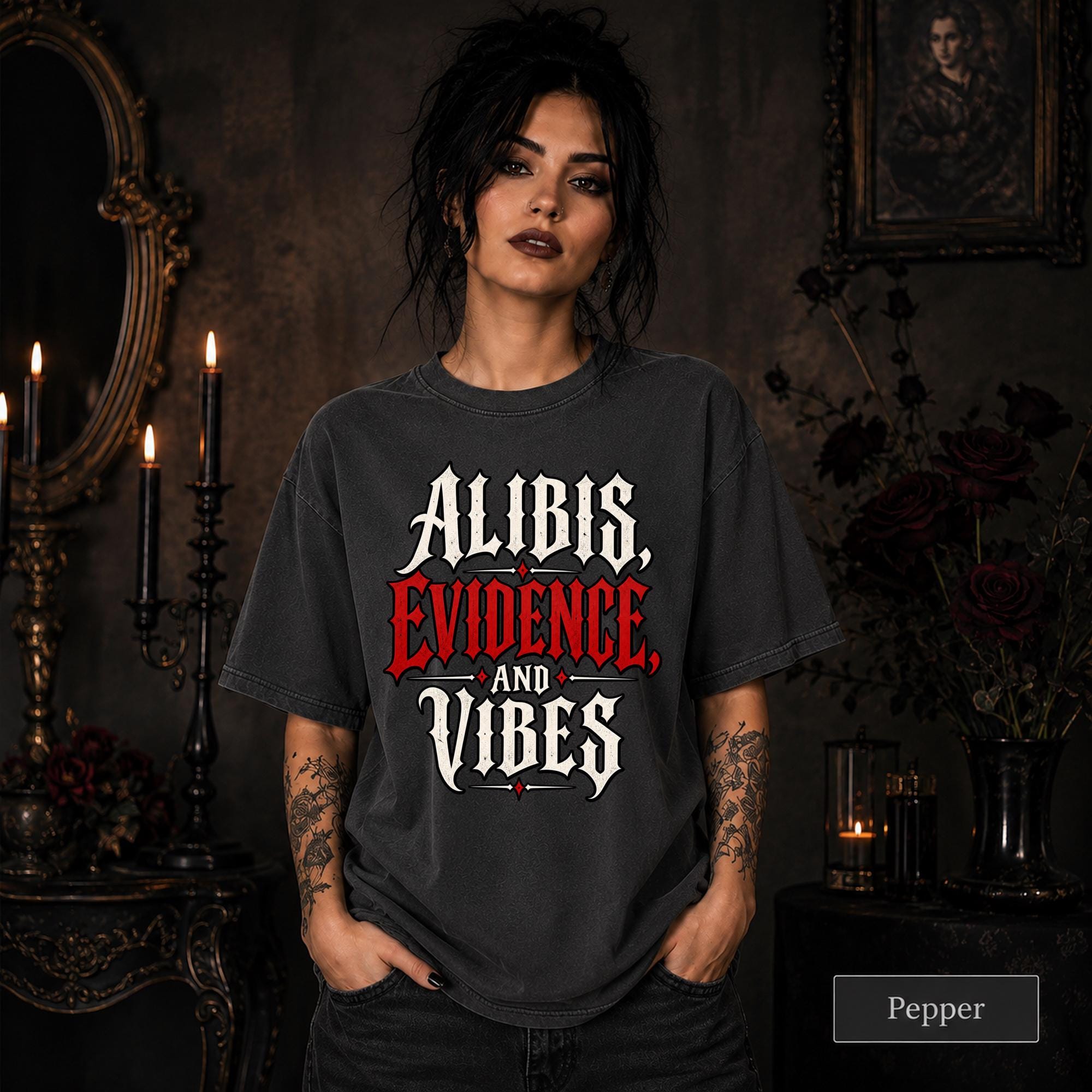 Alibis Evidence and Vibes graphic T-shirt in pepper featuring bold red and white gothic lettering on a dark unisex tee.