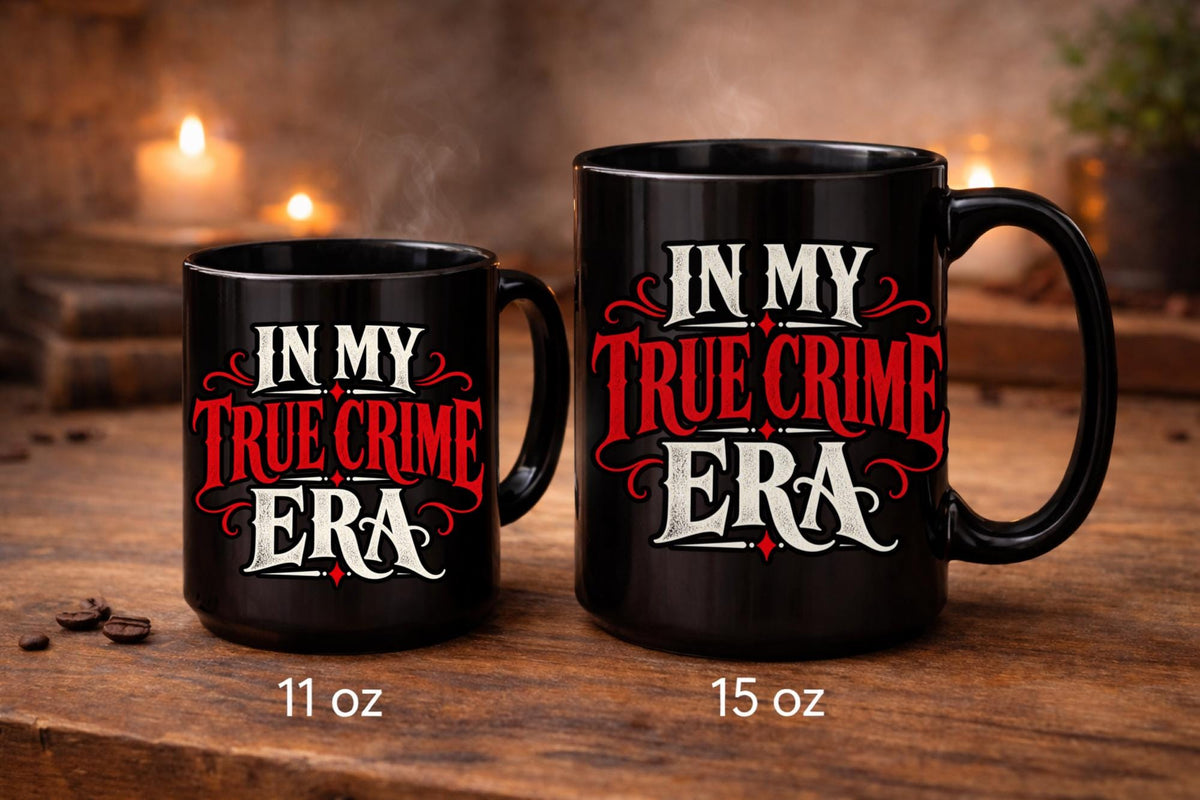 Black In My True Crime Era mugs in 11 oz and 15 oz sizes featuring bold red and cream gothic lettering on ceramic coffee cups.