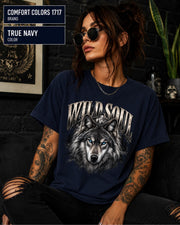 Wild Soul wolf graphic Comfort Colors 1717 T-shirt in true navy featuring a detailed gray wolf with bright blue eyes and forest-inspired artwork.