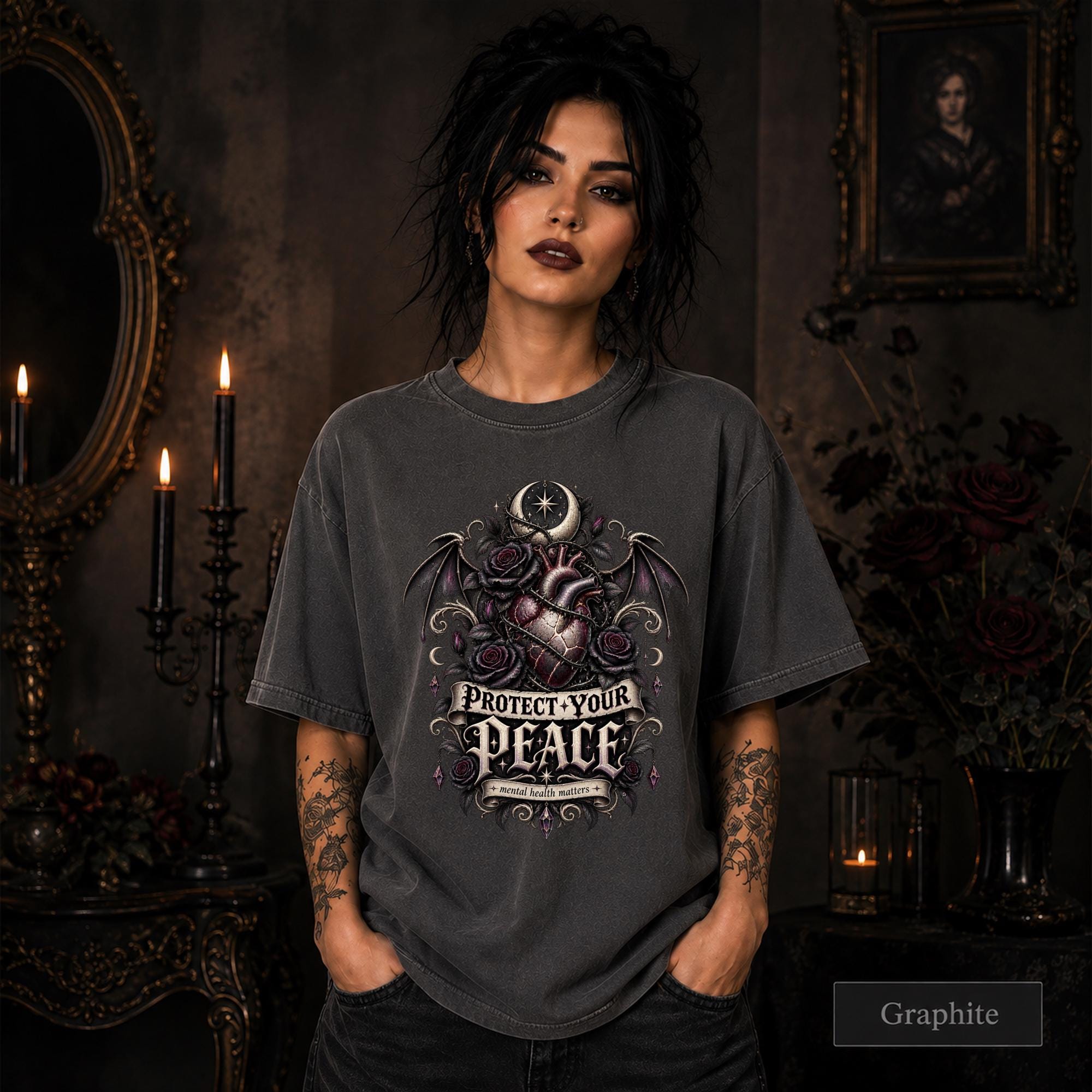 Protect Your Peace gothic graphite T-shirt featuring an anatomical heart, dark roses, bat wings, crescent moon, and mental health matters artwork.