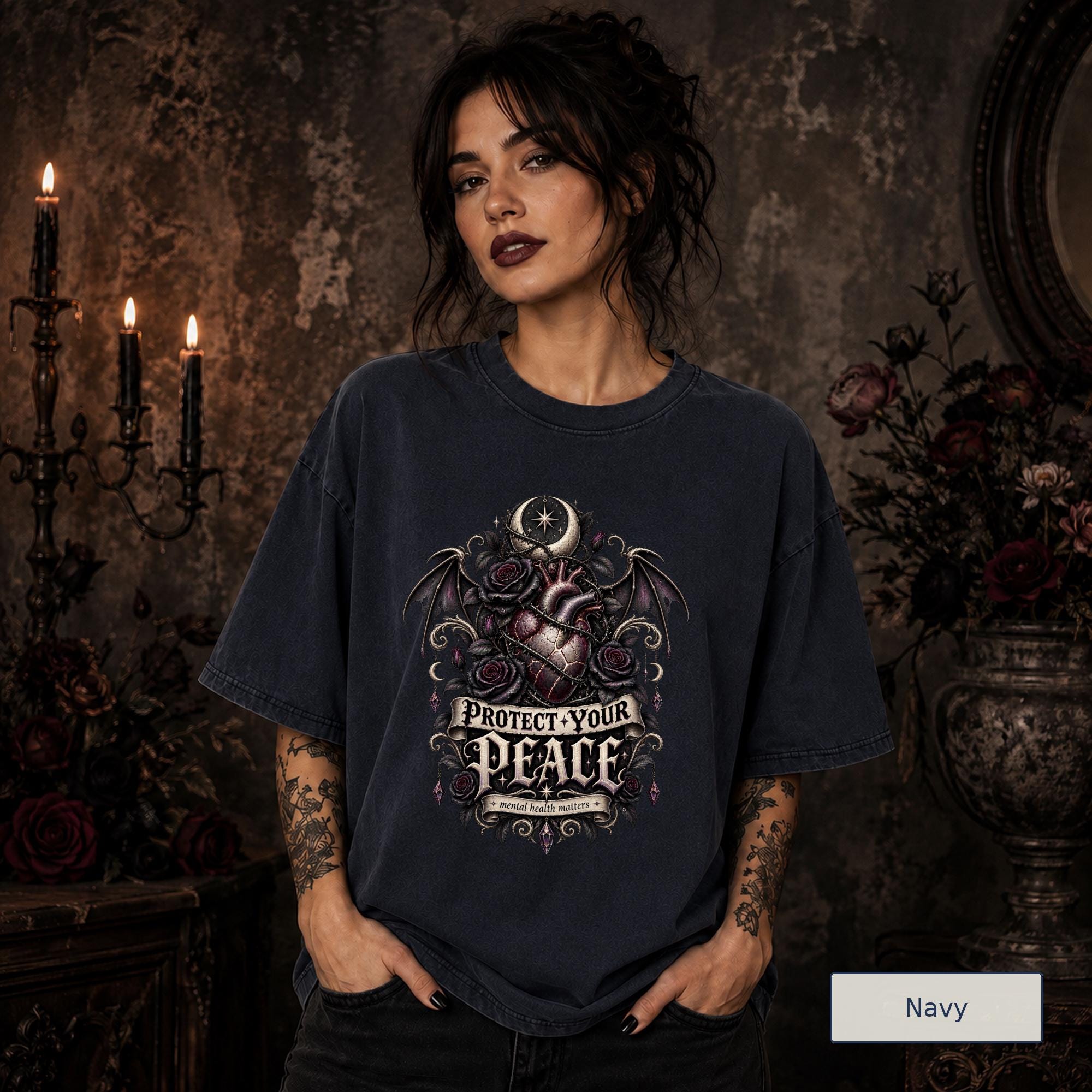 Protect Your Peace gothic navy T-shirt featuring an anatomical heart, dark roses, bat wings, crescent moon, and mental health matters artwork.