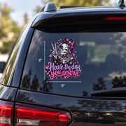 Cute goth skeleton girl Have the Day You Deserve decal shown on an SUV window with pink hearts, sparkles, and bold script text.