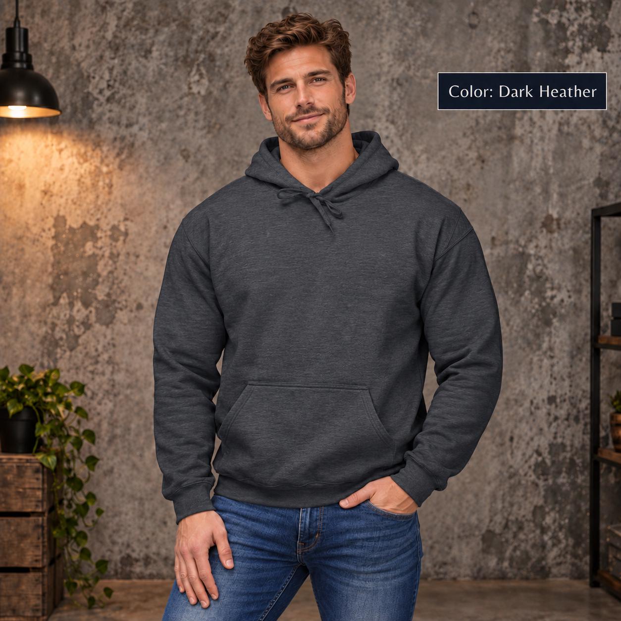 Dark Heather unisex hoodie shown from the front with a large Lost Compass Supply graphic featuring on the back a vintage compass, moonlit forest, directional markings, and the phrase “Direction Is Overrated.”