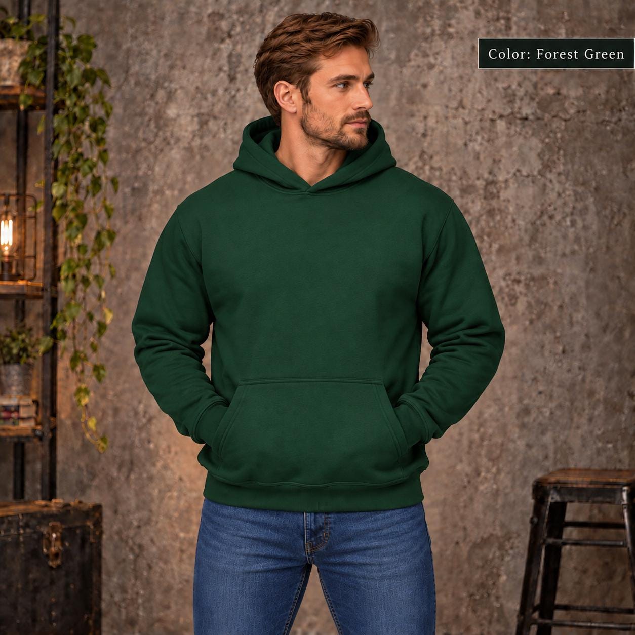 Forest Green unisex hoodie shown from the front with a large Lost Compass Supply graphic featuring on the back a vintage compass, moonlit forest, directional markings, and the phrase “Direction Is Overrated.”