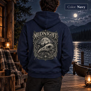 Navy unisex hoodie shown from the back with a large Midnight Naturalist Society graphic featuring a bird skull, moon, mountains, forest plants, and vintage gothic botanical details.