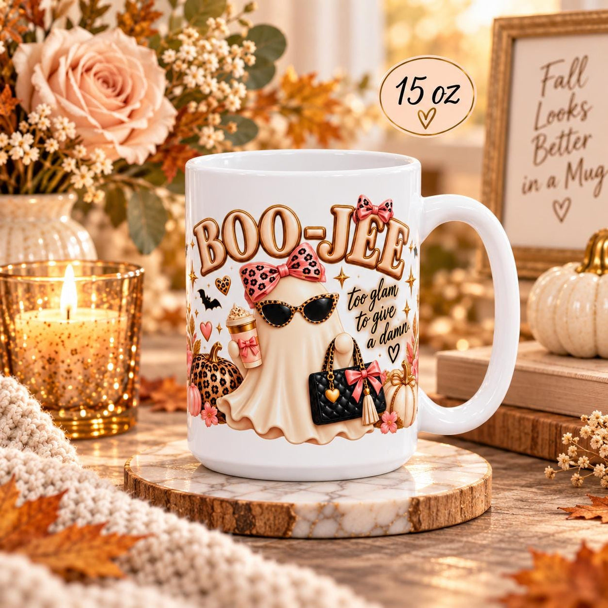 15 oz Boo-Jee coffee mug mockup with glam ghost artwork in a cozy rustic autumn setup with simple decor, warm lighting, and size label.