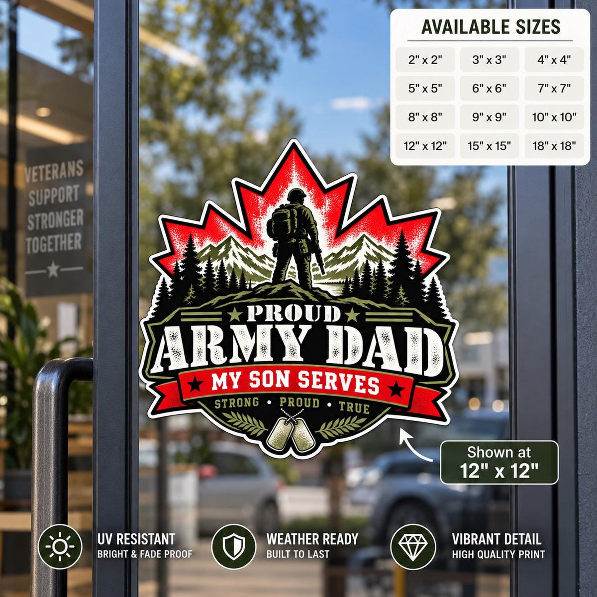 Proud Army Dad My Son Serves UV DTF decal displayed on a storefront glass door with military silhouette, mountains, maple leaf, and dog tags.
