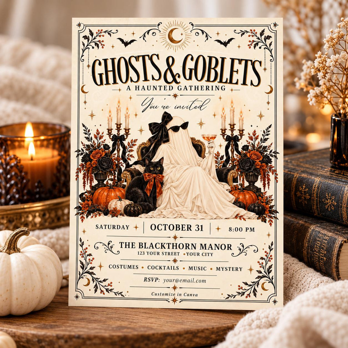 Vintage haunted gathering invitation displayed in a warm fall setting with candlelight, pumpkins, and antique books.