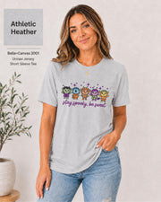 Bella+Canvas 3001 Athletic Heather unisex T-shirt featuring five cute Halloween-inspired characters with stars and the phrase “Stay Spooky, Be Sweet” in a small centered chest design.